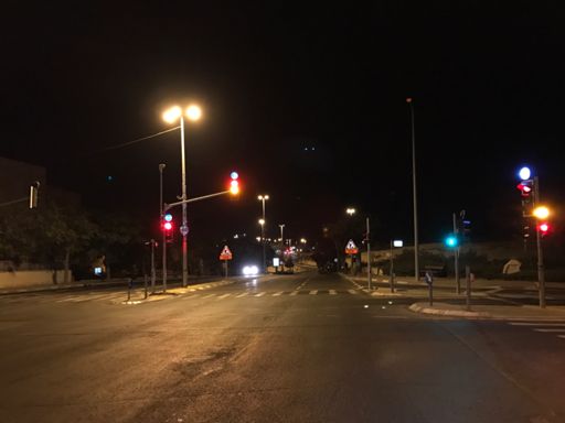 Gilo. Approaching car was the police. They found me a bit suspicious taking pics at 3 am.