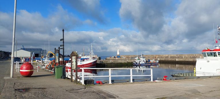 Cluny Harbour built in 1874-80, named after the main funder. Extended in 1888 and 1921. Canmore entry has more photos to put it in context: https://canmore.org.uk/site/133251/buckie-harbour