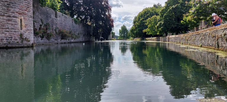Moat round the Bishop's Palace.

https://en.wikipedia.org/wiki/Bishop%27s_Palace,_Wells