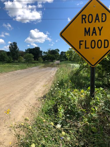 Deep! My feet got wet!! Coon Lake Rd just east of Dutcher