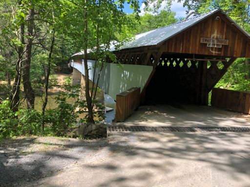 Excellent article in the New York Times with pics from all over Alabama. This bridge was in there, but I think they may have photoshopped it to remove grafitti ... or maybe it was an old pic. I went out of my way slightly to swing by the bridge to see if they had redone in the wood to remove the grafitti, but it's still there.