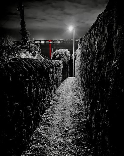 The light on the North side of the Tay Bridge across the firth.