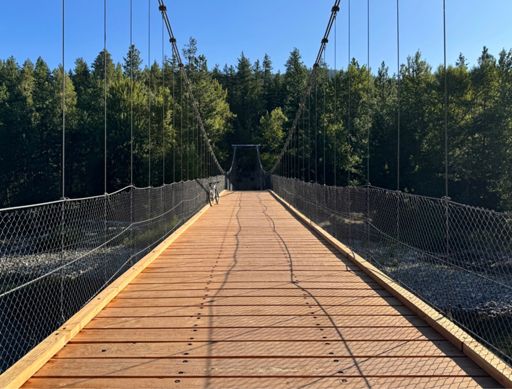 New deck across the span. Strong enough for snocats again. 