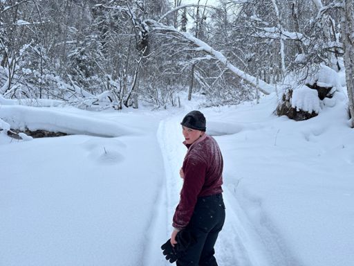 A traveled with this young woman for a while. It was her first snowshoe race. She was having a good time, but it was also a bit more than she had bargained for. 