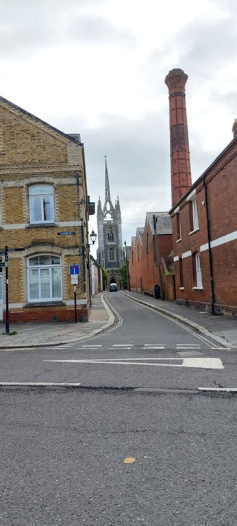 Church and chimney in Faversham to investigate.  Spotted in passing: Grade I listed St Mary of Charity church, & part of Fremlin's Brewery.   CHURCH: Norman with centuries of restoration. Wikipedia entry extends its fascinating history. http://www.stmaryofcharity.org/2.html & https://en.wikipedia.org/wiki/Faversham_Parish_Church  BREWERY: https://en.wikipedia.org/wiki/Fremlin%27s_Brewery & https://historicengland.org.uk/listing/the-list/list-entry/1240601?section=official-list-entry