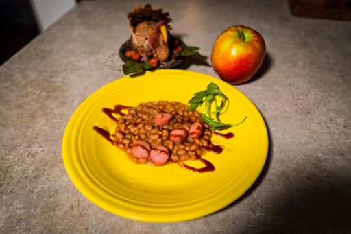 Beef tube cutlet smothered in maple bacon bean au jus and finely drizzled with barbecue sauce and honey.  Delicious 😋 