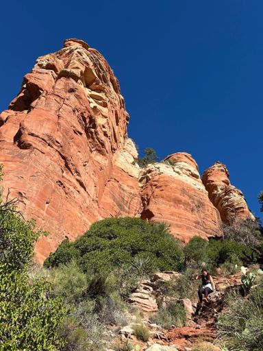 Brittany descending what is definitely not the trail after the ledge.