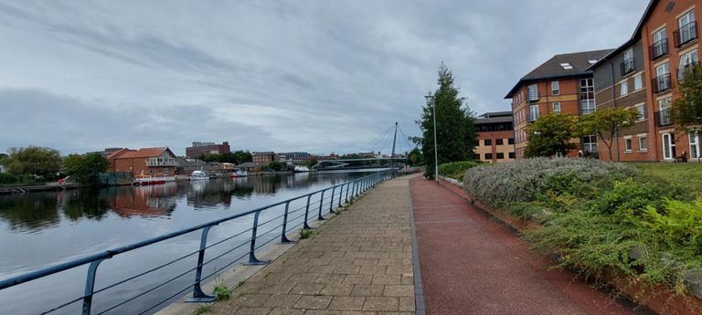 Durham University's Queens Campus purpose-built buildings - on the right. I had routed along the path on the south side of River Tees  for architectural interest.  Teesquay Millennium Footbridge in the distance. https://en.wikipedia.org/wiki/Teesquay_Millennium_Footbridge