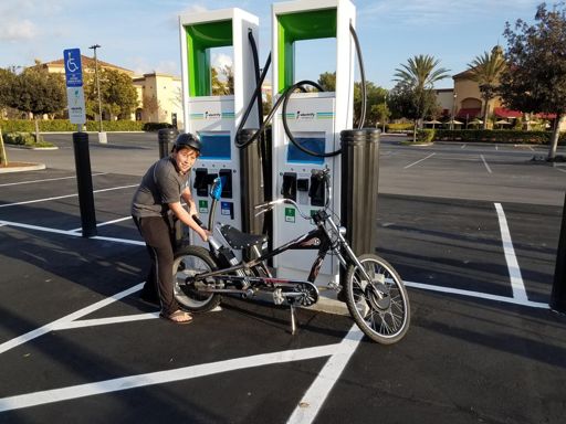 Tyler "charging" his bike at the outlets