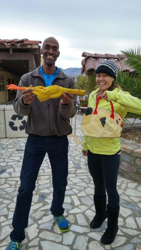 Me posing for a pic with the overall female winner - here's what we took home: A rubber chicken and a prize purse :)