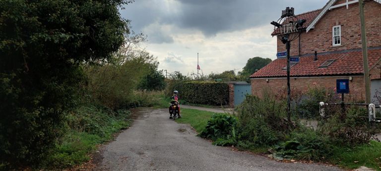 I have retrieved nothing about these signs, using silhouette [or] emblem [or] artwork + sign [or] signposts + York + route + 65