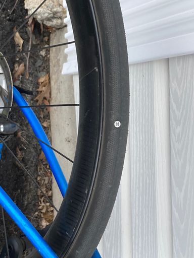 That'll be a flat then. Managed the last 2 k with this embedded in the tire.