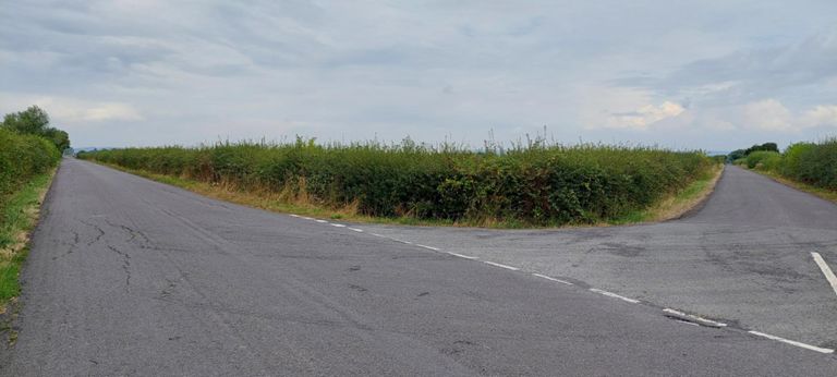 Flat straight roads further than you can see.