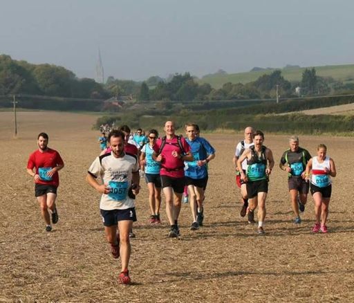 Glad it was dry, running over a field