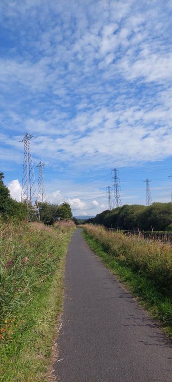 Forth and Cyde Canal towpath is tarmacked and smooth the whole way.  Many photos of the different landscapes we passed through.  By Bishopbriggs.