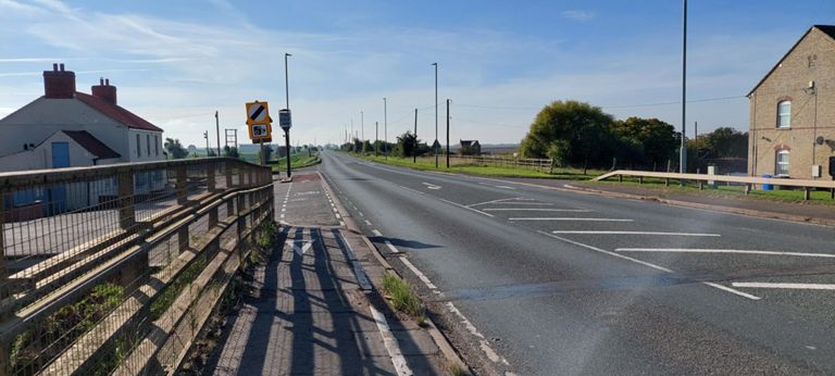 Our view from the bridge in direction of travel. Our route became a cycle path from that left turn.