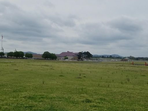 Grandstands and mountains.