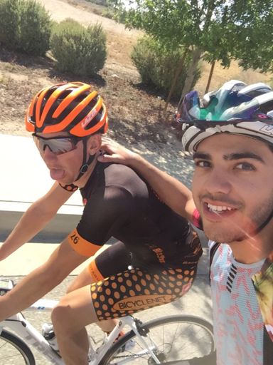 Our faces after getting the KOM. I, happy. Travis, beat.