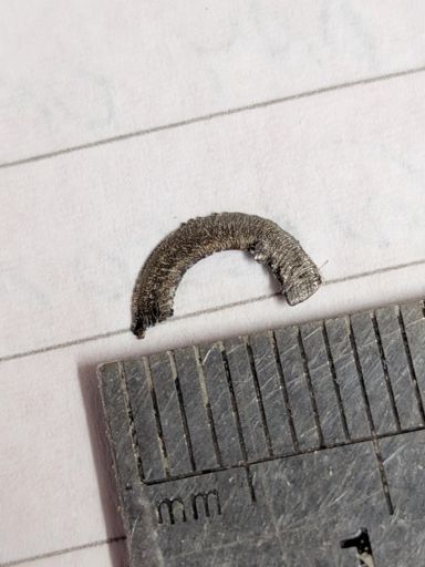 This piece of steel caused my bike's rear tyre flat near the rail overpass on Slade Point Road.