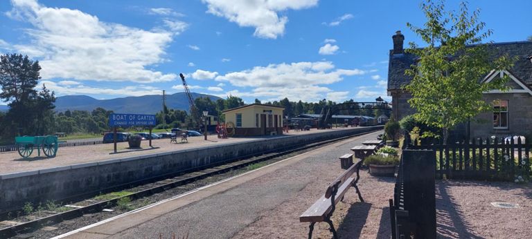 A possibility for coffee nearby, I chose to get on as we had a long day's cycle.  Category B listed Boat of Garten railway station, still as it was in British Railway days.  https://en.wikipedia.org/wiki/Strathspey_Railway_(preserved)#Boat_of_Garten