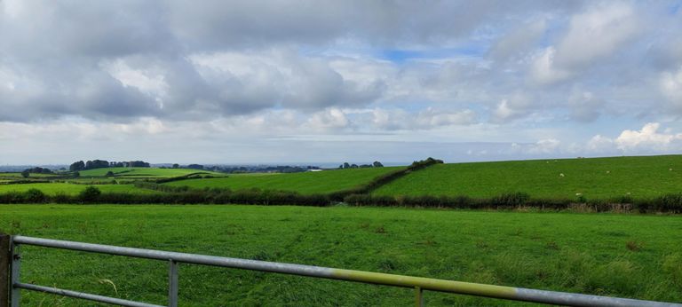 Over beautifully fields looking west towards Morecambe Bay