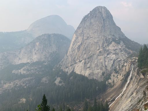 From John Muir Trail on the way back: Nevada Falls under Liberty Cap, with Mt. Broderick (smaller) and Half Dome (bigger) in the distance