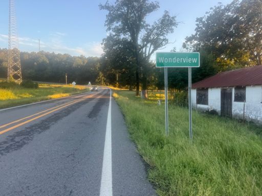 Hitting this town at sunset, I expected great things ... but the clouds were covering up the Ozarks behind me so not really that great a view on either side of the ridge.