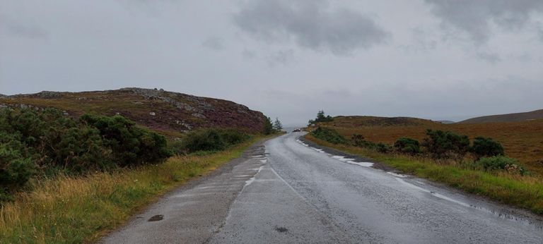 Cycling from River Naver Bridge, I looked up at the vast hill on the right we would cycle beside, comforted that roads follow valleys... Alas, not the A836 here, feet below the hill top!   Location: just before the highest part of the road, lunch and Lochan Leacach. https://www.landscapebritain.co.uk/lakes/highland/lochan-leacach/