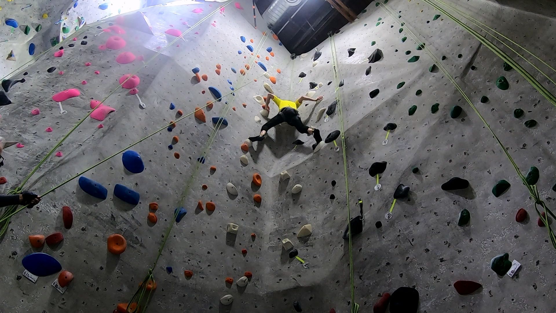 Climb 3 - White 5.10b (F): Climbing this route was the day's highlight for me.  This not-so-new route in the left obtuse corner of The Alcove features mostly stemming and manteling once one gets above the first crease, or about 1/4 of the way up.

I liked that the holds were fairly large, and the big square blocks felt nice in my grasp.  The hardest aspect is reading the route to keep the climbing easy, and these dihedral routes usually give the climber time to pause and consider each move while not accumulating too much fatigue.

I thought the route was challenging yet do-able, provided I could read each move correctly.

I remember not long ago struggling over two, three, or four sessions to send similar routes set in this corner.  Sometimes I physically couldn't bend myself into the right position, sometimes I ran out of ideas, and on others I just ran out of stamina or patience.  This route felt similar to those other occasions, but today my flexibility has improved slightly, and I have better stamina.  Those past routes were rated 5.10c or 