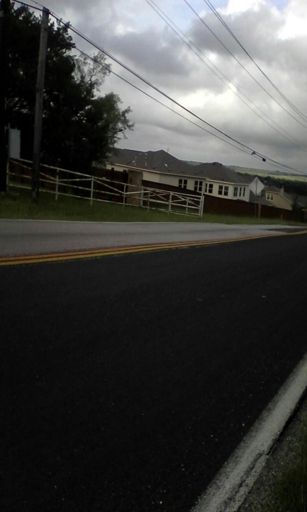 Rural suburb and clouds.