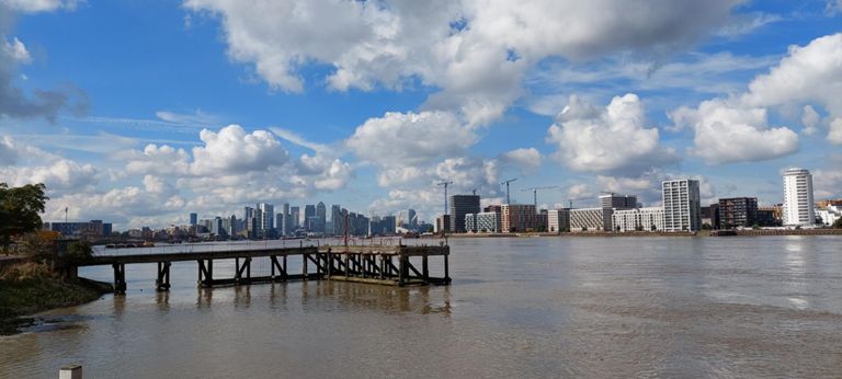 Upstream from beside the Thames Barrier Information Centre.  No Historic England entry for the jetty. On the north shore is now residential Silvertown, and visible beyond is London Docklands including Canary Wharf, etc.  https://en.wikipedia.org/wiki/London_Docklands