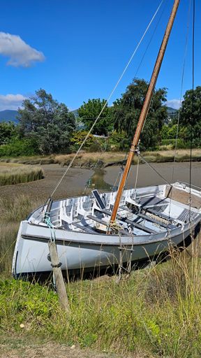 Classic sailing/fishing boat at the inlet near Riwaka (Wharf Road)