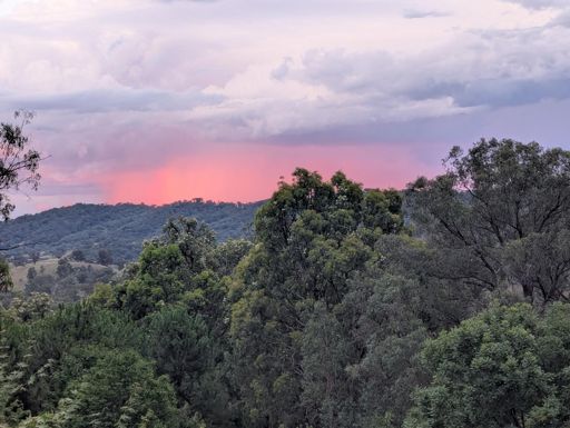 Storms all around, but no rain so far today