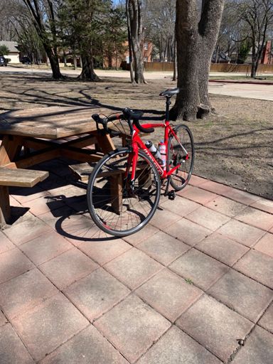 Took off the wheel reflectors and installed my other water bottle cages, new light clamps, and new clip less pedals.