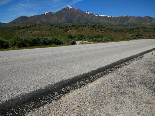 This was super smooth asphalt a week ago- chip n' seal now. Glad I had the cushy Riddler 45 mm tires this time.