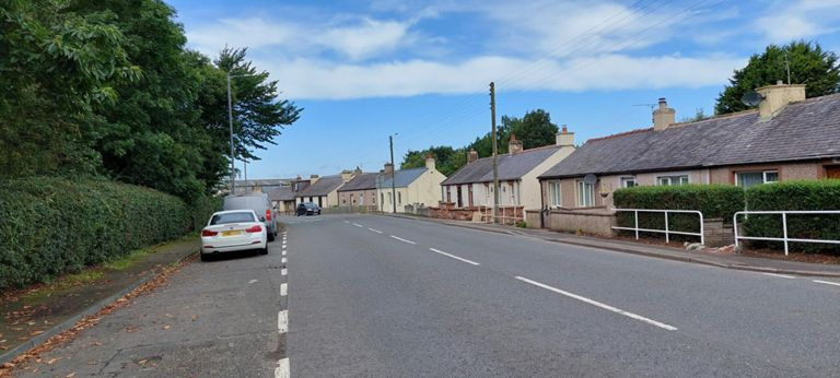 The sudden switch to single storey terraced cottages since entering Scotland. These are  in Eastrigg.  Not yet discovered why. Searching Google with single storey terraced cottages scotland history