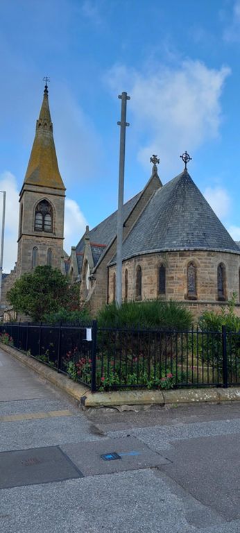 1876 All Saints Episcopal Church, right of Struan House on Cluny Square. Designed by the same architect as did Skibo Castle:https://en.m.wikipedia.org/wiki/Alexander_Ross_(architect)