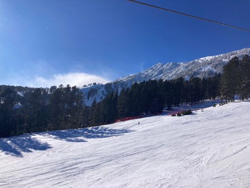 The top of Saddle Peak was obscured by the winds kicking snow over/off the peak.