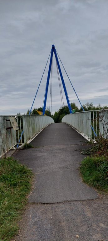 The County Durham Gateway Bridge, opened by PM Tony Blair in Sept 2001, it being in his Sedgefield constituency.   History: http://www.lunemillenniumbridge.info/pages/Teesside/Stockton.html  Photos:  https://www.geograph.org.uk/stuff/list.php?title=County+Durham+Gateway+Bridge&gridref=NZ4028  Also called Millennium Cycleway Bridge on Durham County Council's info board on the Hurworth Burn Railway Path and  Castle Eden Walkway Bridge in that walkway's guides and in Wikimedia Commons, and County Gates Bridge in a separate Geography photo < https://www.geograph.org.uk/photo/167321 >