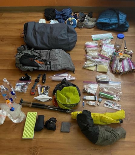 The gear I carried on the trip.  My baseweight was about 9 lbs.  But with food (~9 lbs) and water, it sometimes went as high as 28 lbs or so.  Still pretty light by all accounts.  Previous FKT attempts have carried all of their own water for the trip, which meant starting with a 90 lbs pack!  Yikes.