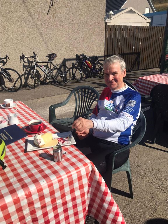 Cheesecake with custard and a black coffee