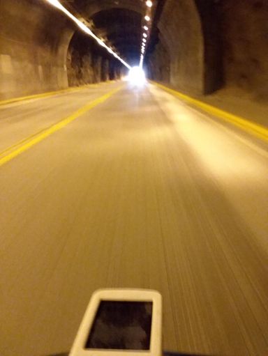 Through the tunnel on the way down, with a rear flashing light of course