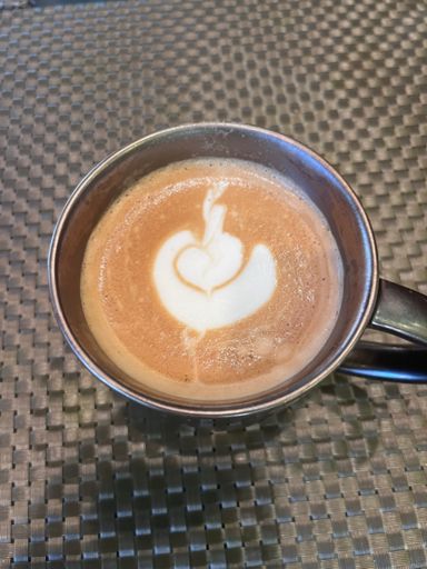 Coffee after a chill ride ….My very first try for latte art …
