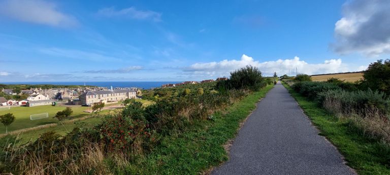 Findochty - its primary school being nearest  and beside playing fields -  and the NCN Route 1 path out of Buckie. https://en.wikipedia.org/wiki/Findochty