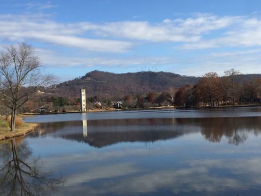 The Bell Tower at Furman and Paris Mountain reflected in the lake