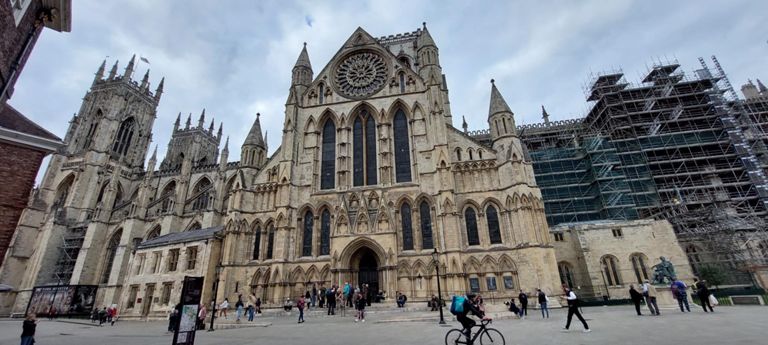 Oldest part of the minster, the South Transept, and way in for evensong.  The low building attached to the left is the shop.