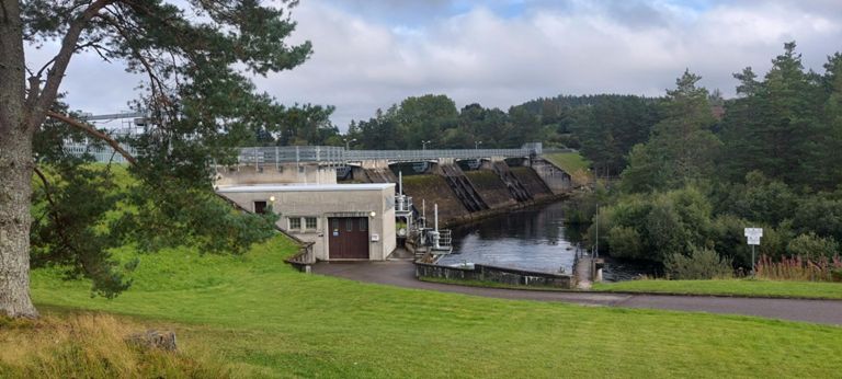 Shin Diversion Dam. Cannot confirm when commissioned; assume 1959 like the rest of the project. https://canmore.org.uk/site/5068/little-loch-shin-dam