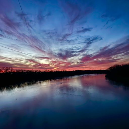 Sunset over Kaw River from Oakland Expressway Bridge.