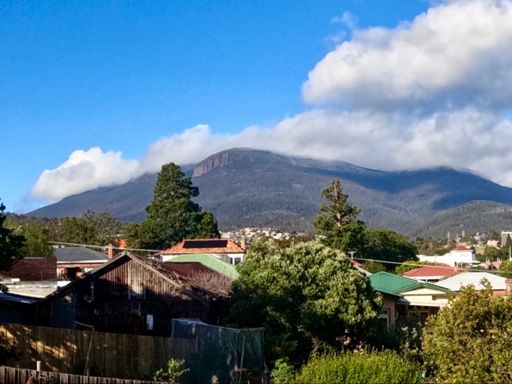 kunanyi kept coming in and out of cloud while we were riding. There is in fact a light dusting of snow at the top