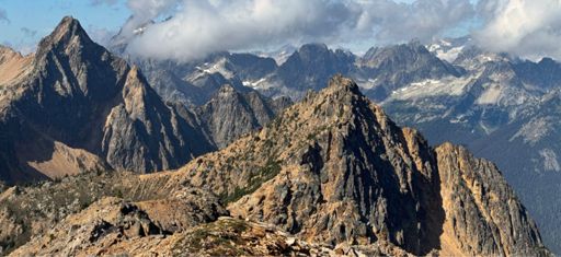 Long winding ridge. Porcupine peak at left. Black peak and Fischer spires in the distance. 